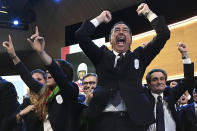 Mayor of Milan Giuseppe Sala and members of Milan-Cortina delegation celebrate after winning the bid to host the 2026 Winter Olympic Games, during the first day of the 134th Session of the International Olympic Committee (IOC), at the SwissTech Convention Centre, in Lausanne, Switzerland, Monday, June 24, 2019. Italy will host the 2026 Olympics in Milan and Cortina d'Ampezzo, taking the Winter Games to the Alpine country for the second time in 20 years. (Philippe Lopez/Pool via AP)