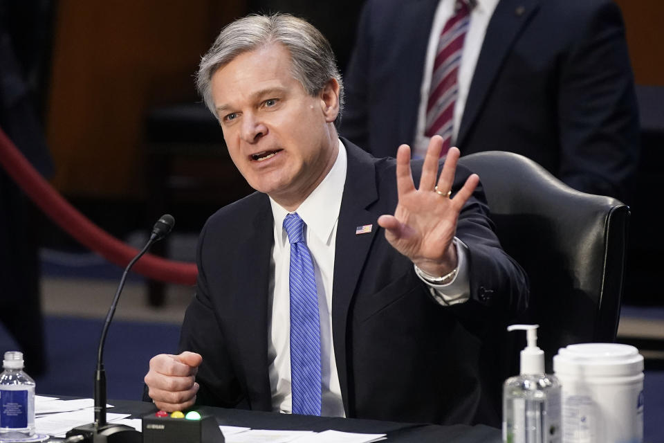 FBI Director Christopher Wray testifies before the Senate Judiciary Committee on Capitol Hill in Washington, Tuesday, March 2, 2021. Wray is condemning the Jan. 6 riot at the Capitol as “domestic terrorism.” (AP Photo/Patrick Semansky)