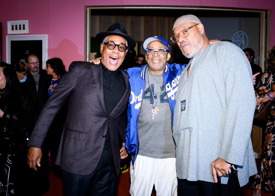 Giancarlo Esposito, left, Spike Lee and Laurence Fishburne pose together at the "Spike Lee: Creative Sources" exhibition at the Brooklyn Museum on Tuesday.