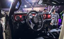 <p>The 2020 Jeep Gladiator JT pickup easily is one of the most-anticipated vehicles-and worst-kept secrets-in recent memory. <u><a rel="nofollow noopener" href="https://www.caranddriver.com/news/jeep-wrangler-pickup-truck-release-date" target="_blank" data-ylk="slk:Fully functional Jeep Gladiator mules;elm:context_link;itc:0;sec:content-canvas" class="link ">Fully functional Jeep Gladiator mules</a> </u>have been prowling the roads of southeastern Michigan, northern Ohio, and other locales for nearly two years now, but their three-box profile revealed few of the significant details of the new pickup's design. While everyone expected the new pickup would be Wrangler-based, essentially a modern Scrambler, the truth is that the Gladiator is well beyond a Wrangler with a pickup bed. Jeep ensured its new mid-size truck could hold its own against other mid-size trucks in towing, payload, and general usefulness.</p>
