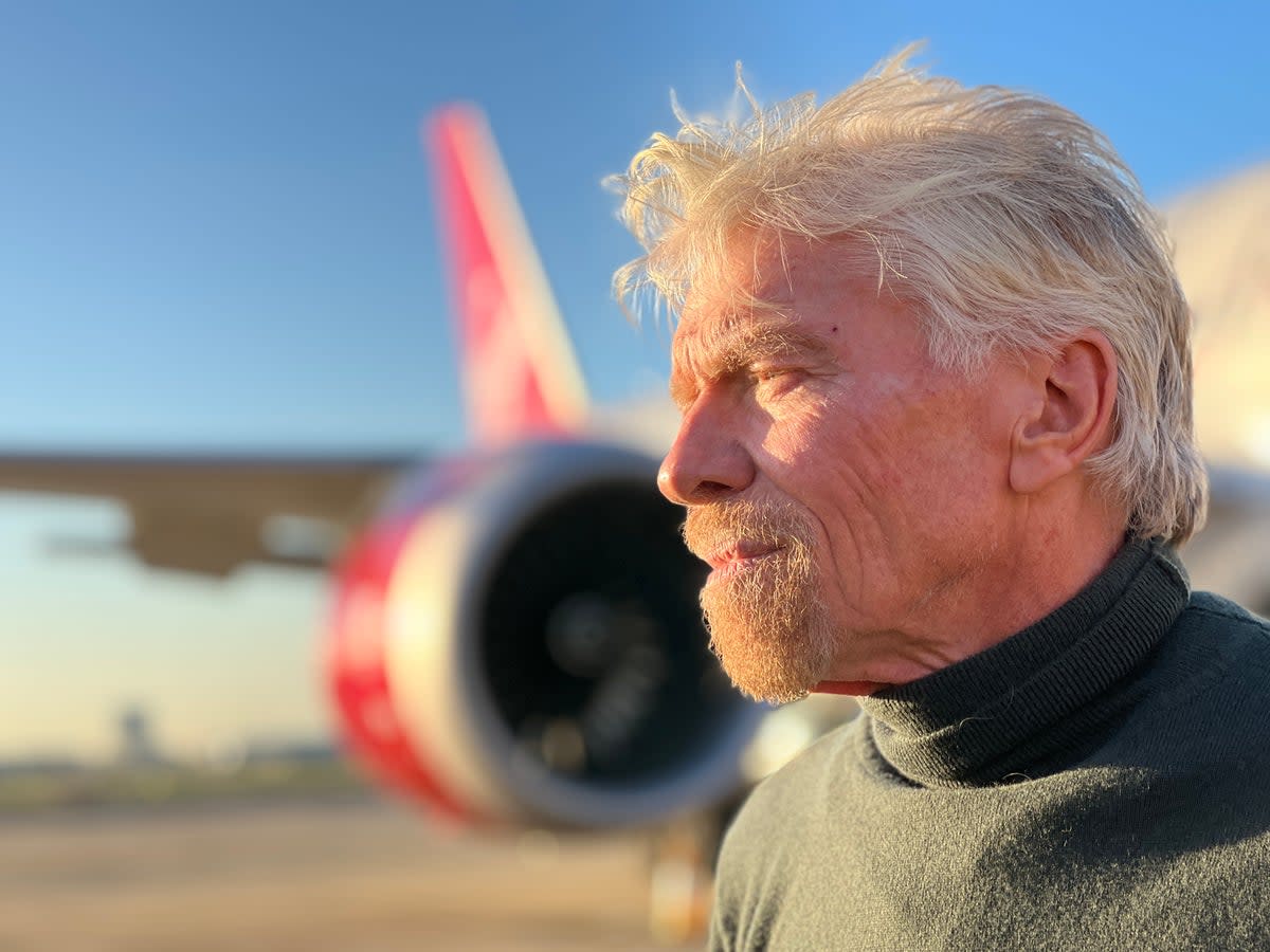 Air pioneer: Sir Richard Branson beside a Virgin Atlantic at London Heathrow Boeing 787 Dreamliner about to depart to New York JFK  (Simon Calder)