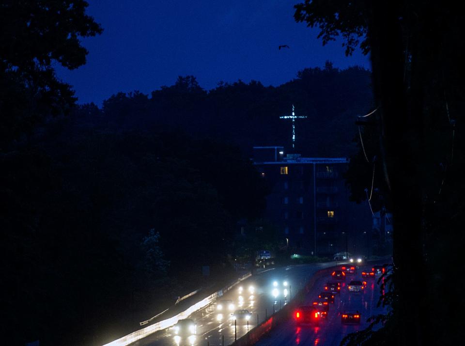 A 60-foot-tall cross on the Sons of Mary Missionary Society property on Salem End Road in Framingham greets motorists traveling westbound on Route 9, June 17, 2023.