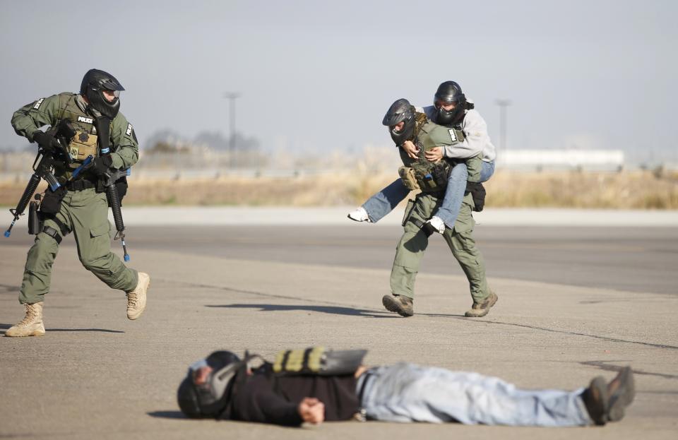 California's tactical team rescue a participant as part of a training exercise Oct. 26, 2013. (Reuters)