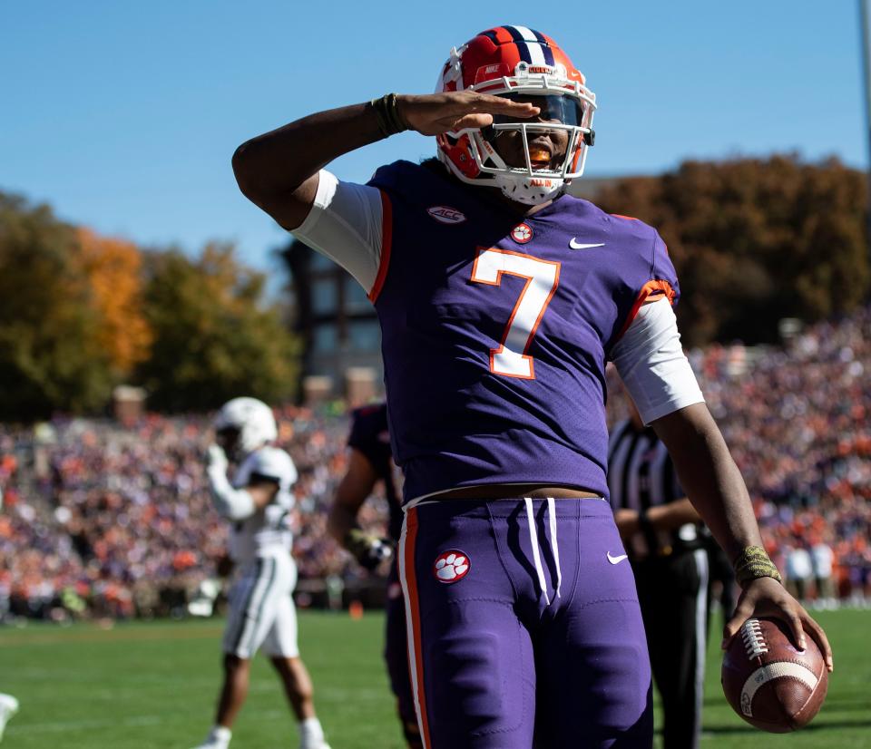 Clemson backup quarterback Taisun Phommachanh celebrates his touchdown drive in the first half Saturday against UConn.