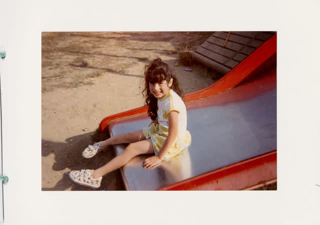 <p>Courtesy of HarperCollins</p> Amy's parents say the songwriter — seen here in a photo from the 1980s — was a normal little girl.