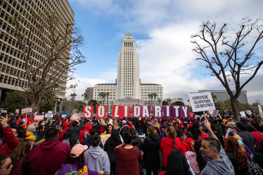 United Teachers of Los Angeles and SEIU 99 members hold a joint rally at Grand Park in a historic show of solidarity.