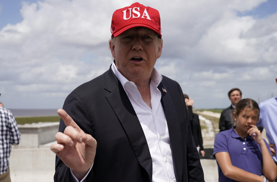 President Trump speaks as he visits Lake Okechobee and the Herbert Hoover Dike in Canal Point, Fla., in March. (Joshua Roberts/Reuters)