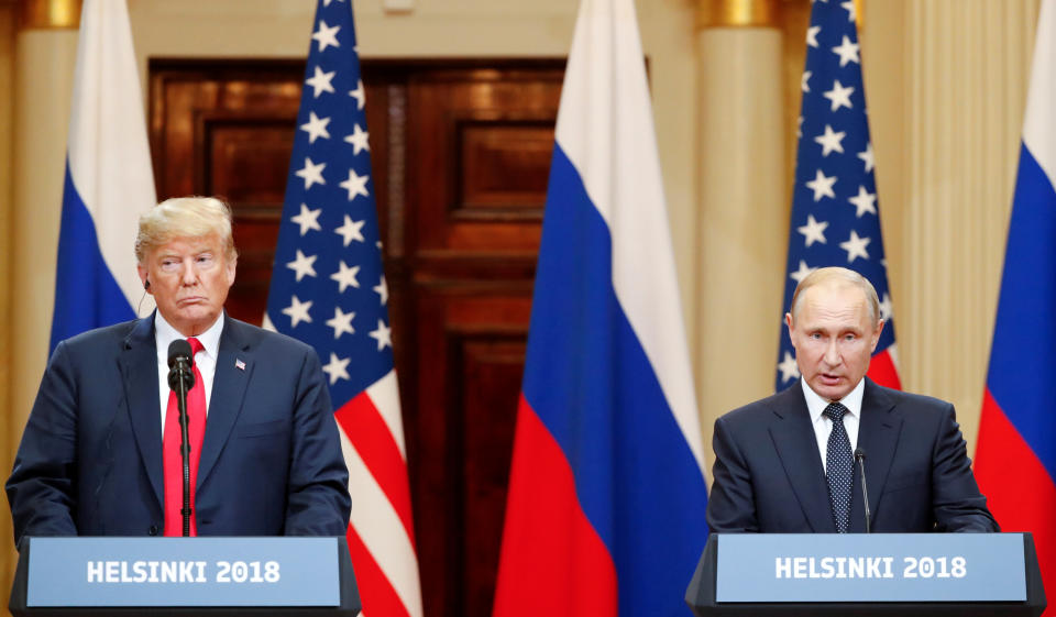 FILE PHOTO: U.S. President Donald Trump and Russian President Vladimir Putin hold a joint news conference after their meeting in Helsinki, July 16, 2018. REUTERS/Grigory Dukor/File Photo