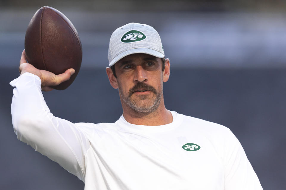 EAST RUTHERFORD, NEW JERSEY - AUGUST 19: Aaron Rodgers #8 of the New York Jets warms up before the preseason game against the Tampa Bay Buccaneers at MetLife Stadium on August 19, 2023 in East Rutherford, New Jersey. (Photo by Dustin Satloff/Getty Images)