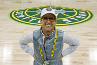 Seattle Storm co-owner Ginny Gilder poses for a photo on May 18, 2022, at Climate Pledge Arena during halftime of a WNBA basketball game between the Seattle storm and the Chicago Sky in Seattle. As Title IX marks its 50th anniversary in 2022, Gilder is one of countless women who benefited from the enactment and execution of the law and translated those opportunities into becoming leaders in their professional careers. (AP Photo/Ted S. Warren)