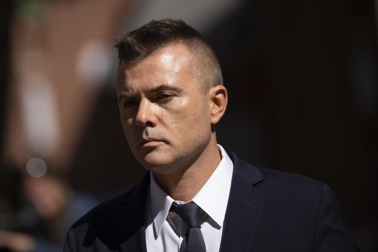 FILE: Russian analyst Igor Danchenko walks to the Albert V. Bryan U.S. Courthouse during a lunch break in his trial on October 11, 2022 in Alexandria, Virginia.  / Credit: Drew Angerer / Getty Images