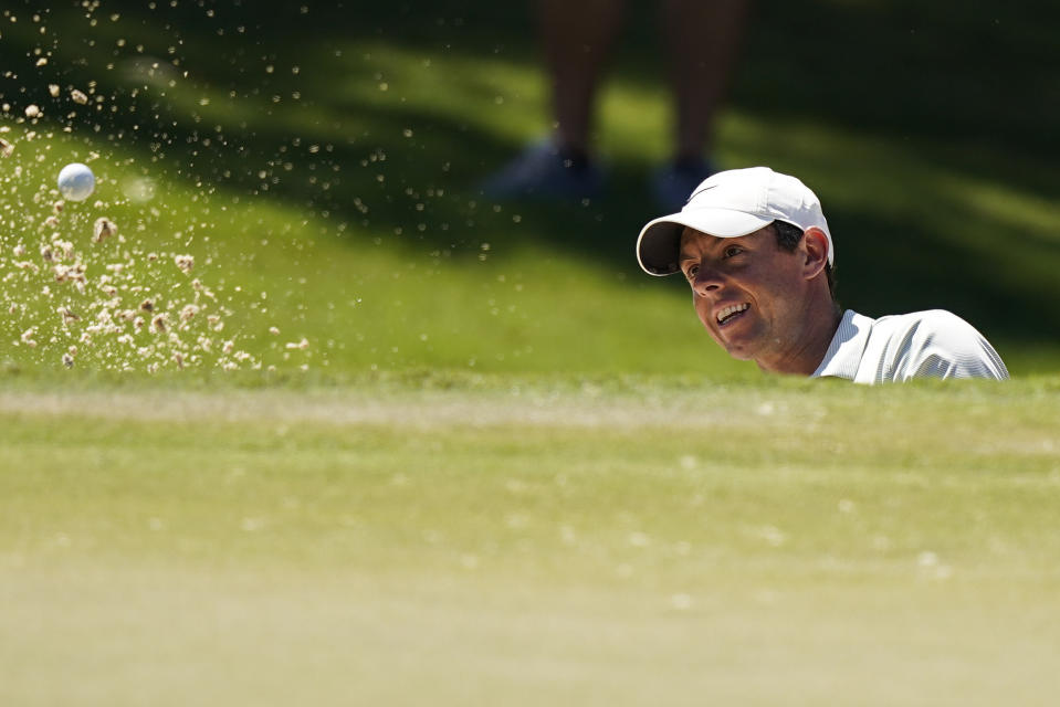 Rory McIlroy of Northern Ireland, hits out of a bunker on the second hole during the third round of the Tour Championship golf tournament Saturday, Sept. 4, 2021, at East Lake Golf Club in Atlanta. (AP Photo/Brynn Anderson)