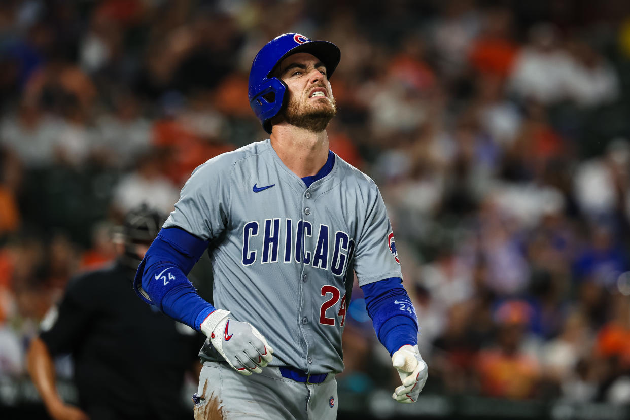 BALTIMORE, MD - JULY 10: Cody Bellinger #24 of the Chicago Cubs reacts after being hit in the hand by a pitch in the seventh inning against the Baltimore Orioles at Oriole Park at Camden Yards on July 10, 2024 in Baltimore, Maryland. (Photo by Scott Taetsch/Getty Images)