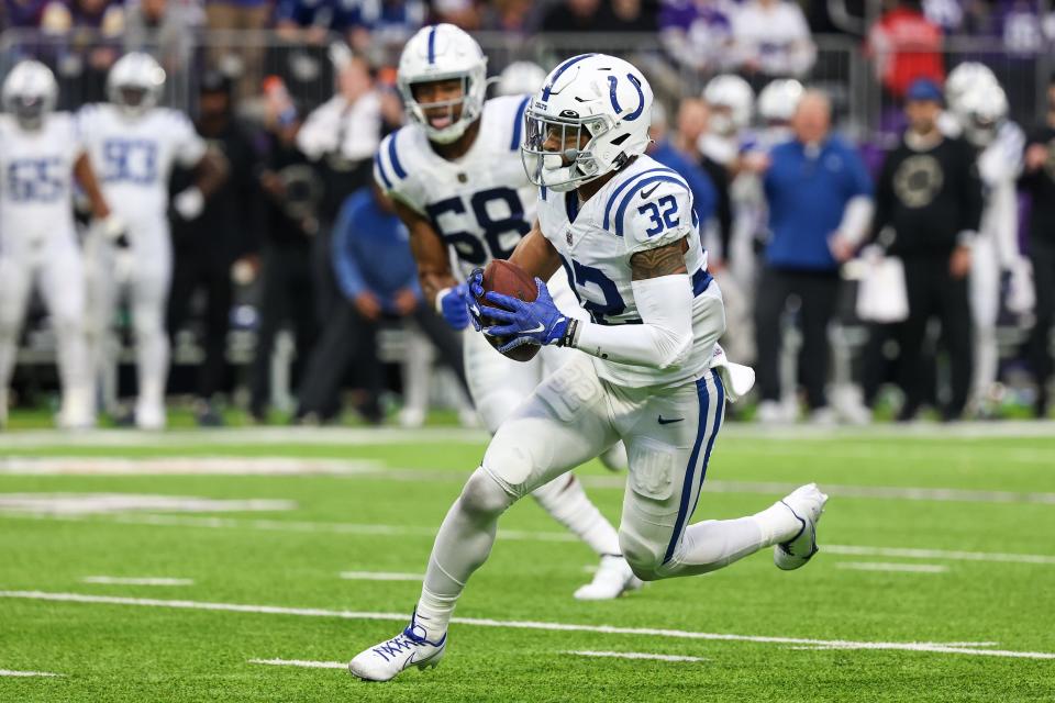 Dec 17, 2022; Minneapolis, Minnesota, USA; Indianapolis Colts safety Julian Blackmon (32) makes an interception against the Minnesota Vikings during the second quarter at U.S. Bank Stadium.