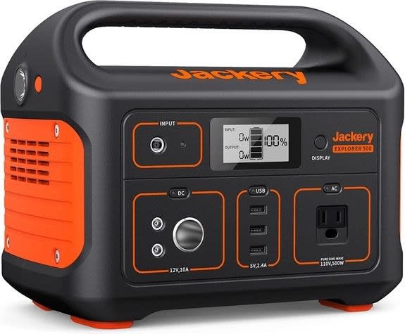 An orange and black Jackery portable power station