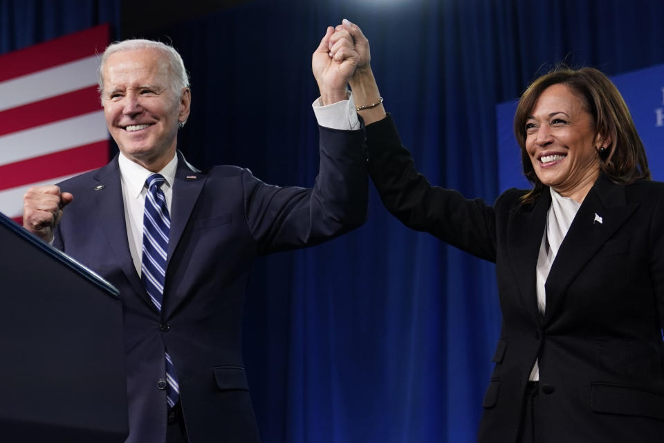 FILE - President Joe Biden and Vice President Kamala Harris stand on stage at the Democratic National Committee winter meeting, Feb. 3, 2023, in Philadelphia. (AP Photo/Patrick Semansky, File)