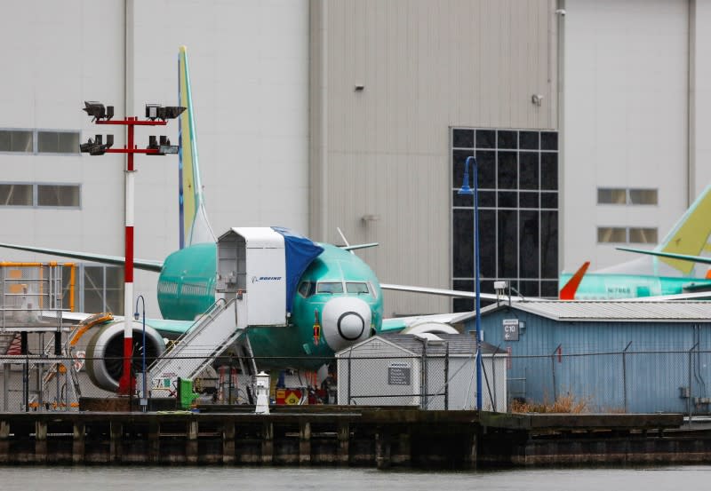 FILE PHOTO: A Boeing 737 Max aircraft is seen parked outside the company's production facility in Renton