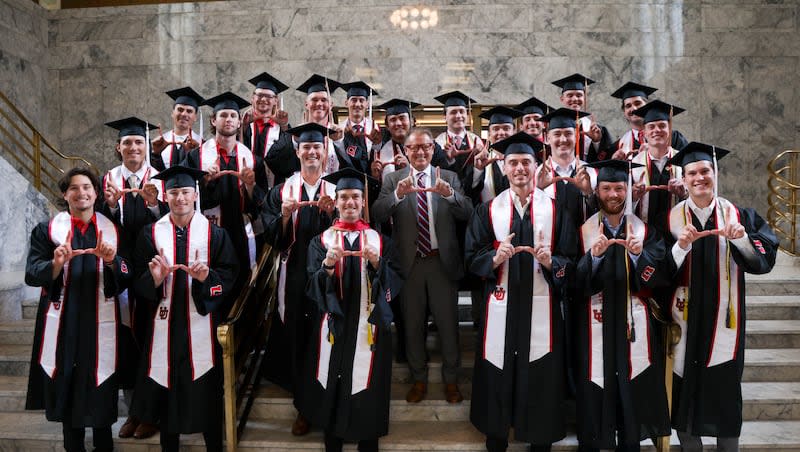 Baseball and lacrosse graduates pose for a photo with University of Utah president Taylor Randall at the John R. Park Building in Salt Lake City, UT on Wednesday, April 24, 2024.