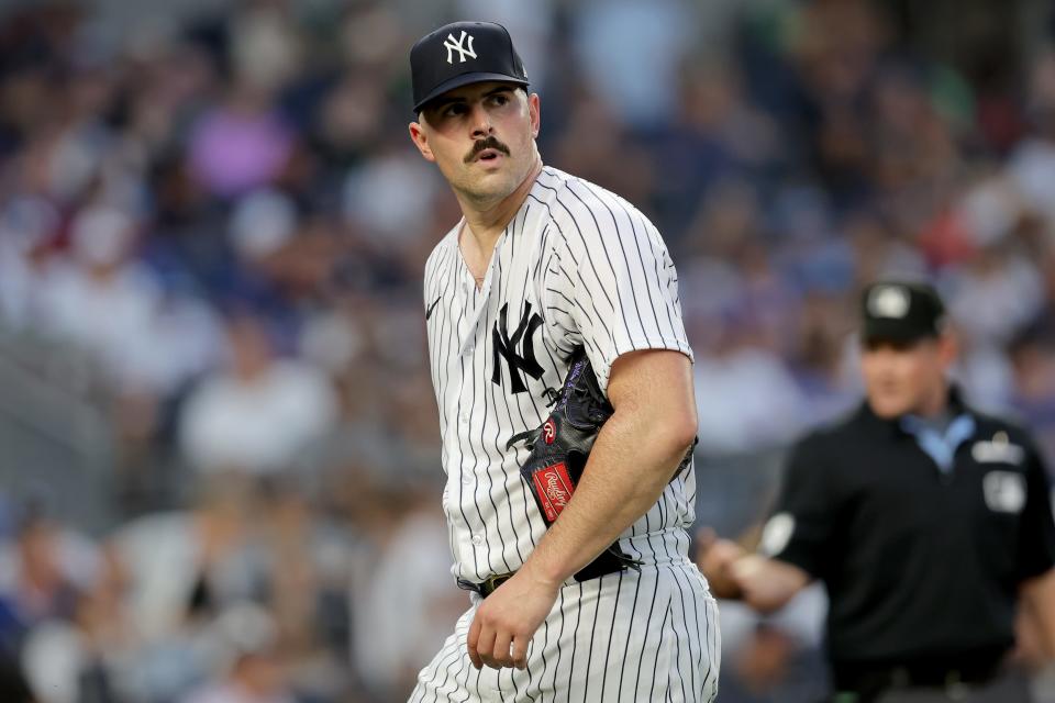 Jul 7, 2023; Bronx, New York, USA; New York Yankees starting pitcher Carlos Rodon (55) reacts during the fifth inning against the Chicago Cubs at Yankee Stadium.