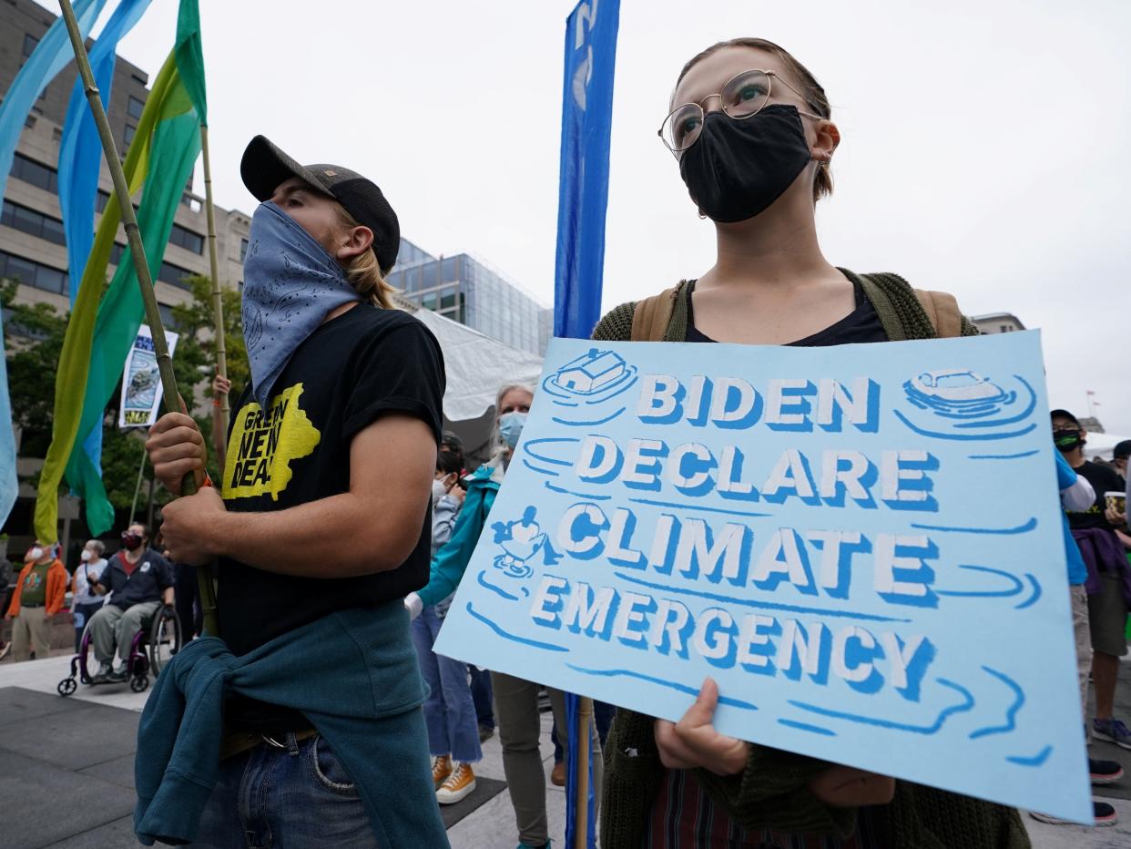 Indigenous activist protest at the White House demanding climate action