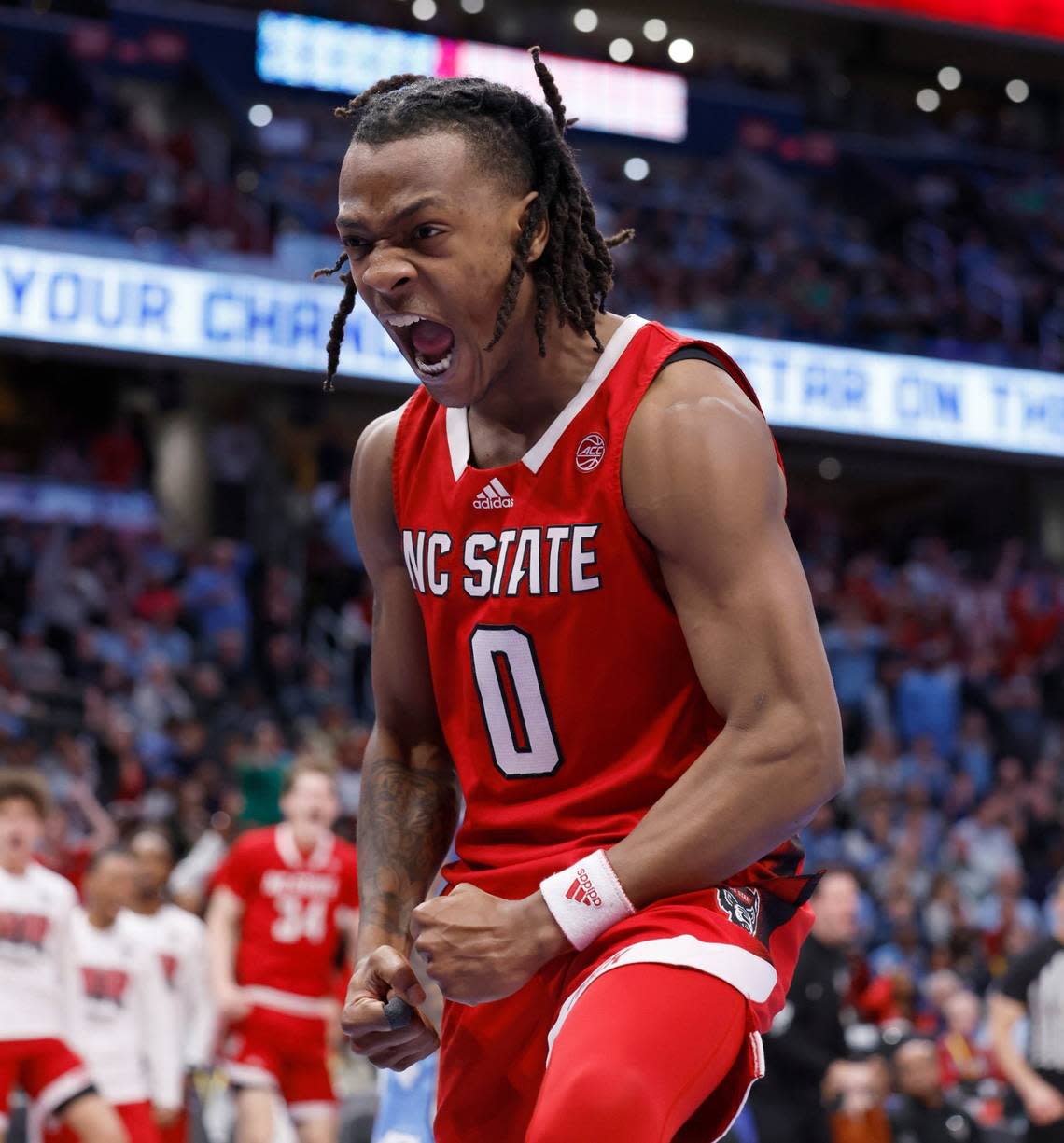 N.C. State’s DJ Horne (0) celebrates after making the basket while being fouled during the second half N.C. State’s 84-76 victory over UNC in the championship game of the 2024 ACC Men’s Basketball Tournament at Capital One Arena in Washington, D.C., Saturday, March 16, 2024.