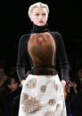 <b>New York Fashion AW13: Weird and wonderful runway looks<br><br></b>Carolina Herrera showed off a new take on the furry chest with this poloneck.