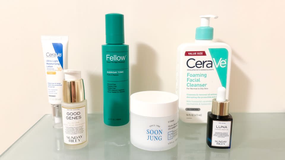 Bottles of skin care that writer uses - Henry T. Casey/CNN Underscored