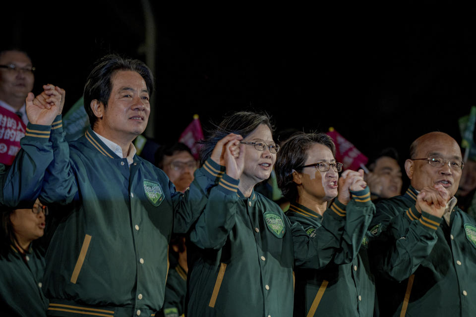 TAIPEI, TAIWAN - JANUARY 11: Taiwan President Tsai Ing-wen (2nd L), Democratic Progressive Party (DPP) presidential candidate, Lai Ching-te (L), hold a campaign rally in Taipei, Taiwan, on January 11, 2024, ahead of the presidential election scheduled for January 13, 2024. Frontrunner Lai, whom China views as a separatist, is leading opinion polls to be Taiwan's next president, which could affect global geopolitics for years to come. (Photo by Man Hei Leung/Anadolu via Getty Images)