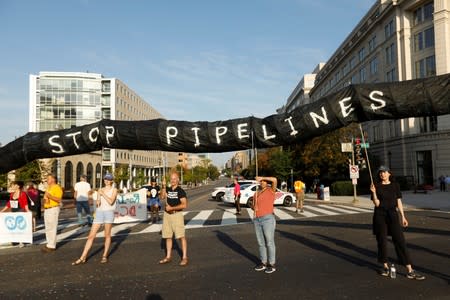 Environmental activists block traffic as part of climate change protest in Washington
