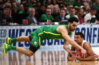 <p>D’Mitrik Trice #0 of the Wisconsin Badgers grabs a loose ball against Ehab Amin #4 of the Oregon Ducks in the first half during the first round of the 2019 NCAA Men’s Basketball Tournament at SAP Center on March 22, 2019 in San Jose, California. </p>