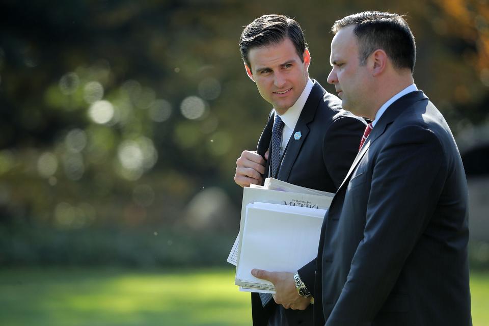 John McEntee, personal aide to President Trump, left was fired, March 12, 2018, for unspecified security reasons. He's seen with White House Director of Social Media Dan Scavino leaving the White House Nov. 29, 2017.