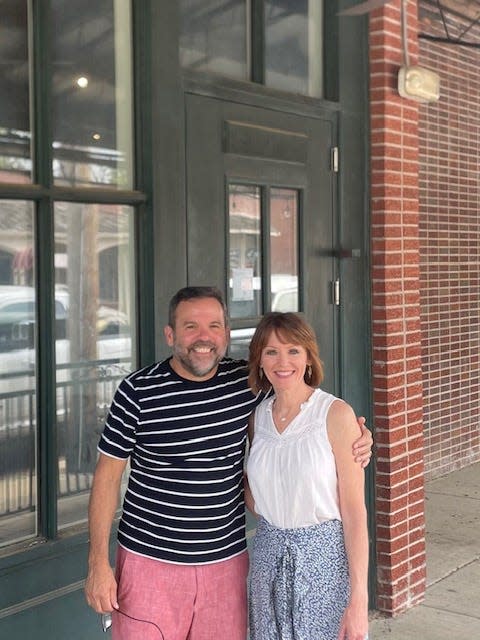 David Grisanti, left, and his wife, Robyn Grisanti, pose in front of their new restaurant location in Collierville Town Square. David Grisanti's On Main will open in about two months.