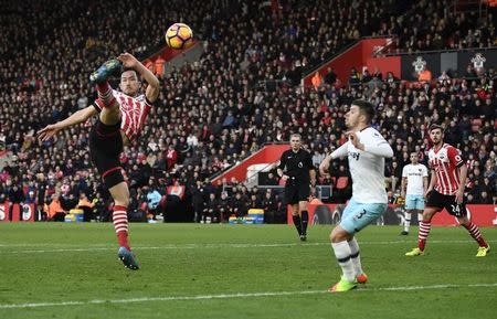 Britain Football Soccer - Southampton v West Ham United - Premier League - St Mary's Stadium - 4/2/17 Southampton's Maya Yoshida in action with West Ham United's Aaron Cresswell Reuters / Dylan Martinez Livepic