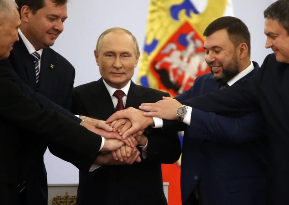 <div class="inline-image__caption"><p>Russian President Vladimir Putin with Ukrainian regional separatist leaders attends the annexation ceremony of four Ukrainian regions at the Grand Kremlin Palace, Sept. 30, 2022, in Moscow, Russia.</p></div> <div class="inline-image__credit">Getty</div>