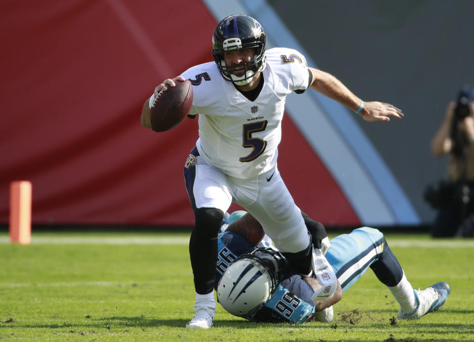 The Ravens and the Titans are in a battle for mediocrity. (AP)