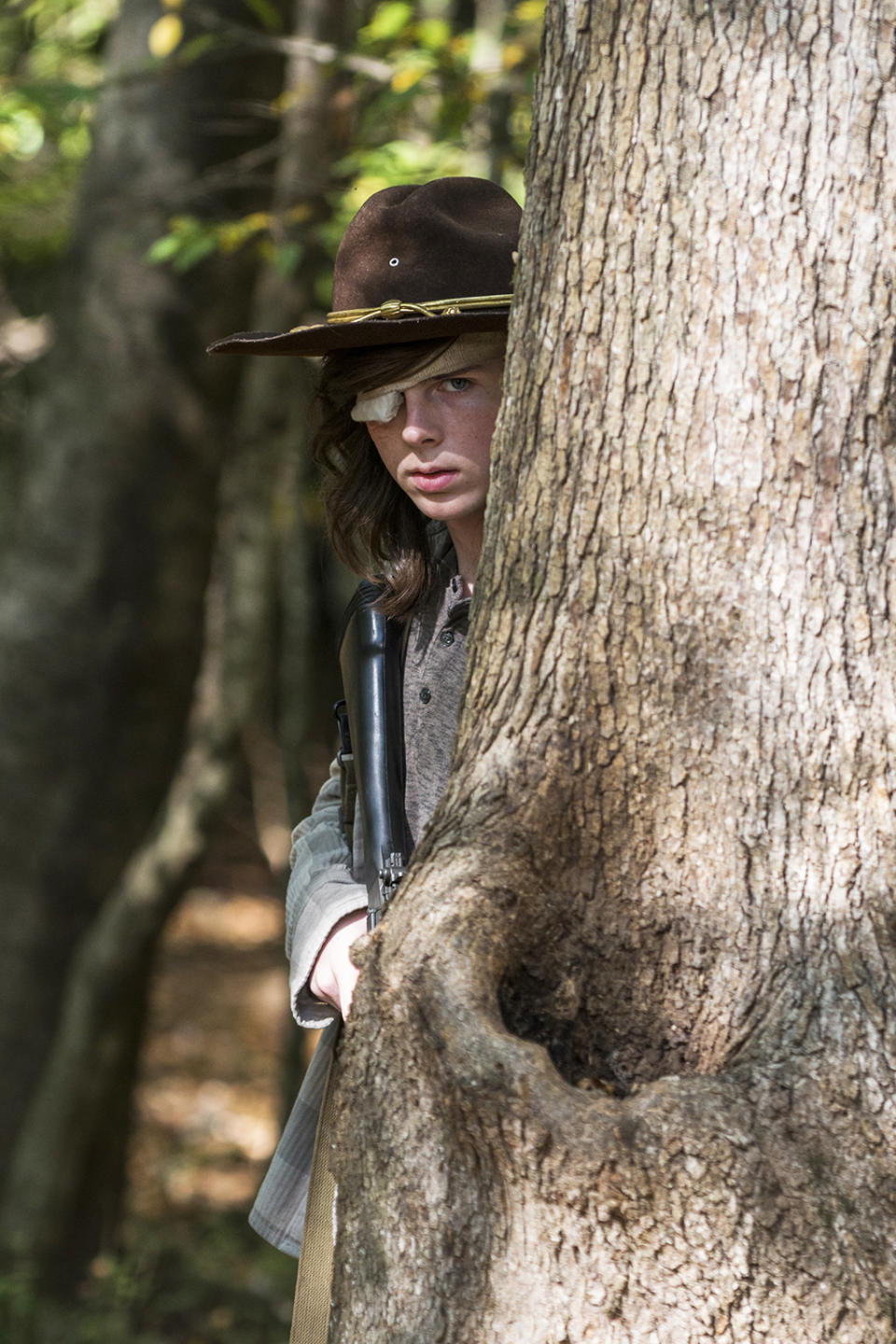 <p>Chandler Riggs as Carl Grimes (Credit: Gene Page/AMC) </p>