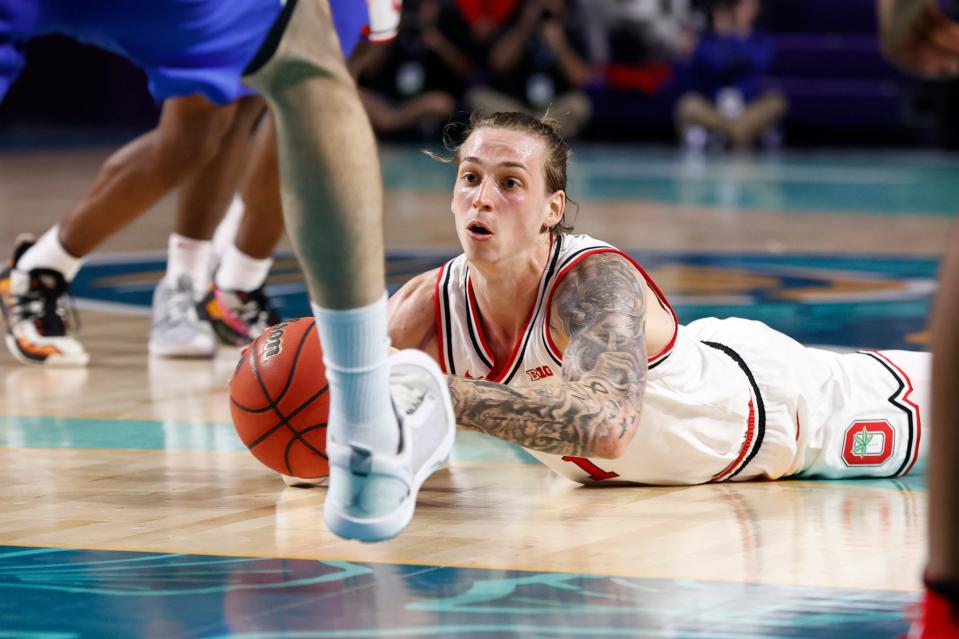 Ohio State guard Jimmy Sotos reaches against Florida on Wednesday.