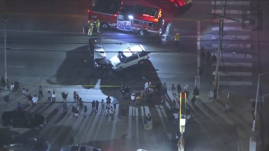 One person was killed and two others, including a young boy, were hospitalized after a suspected hit-and-run crash in South Los Angeles on April 11, 2024. (KTLA)