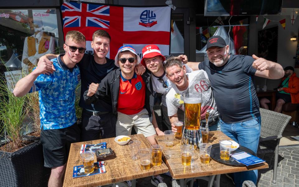 England fans sample the local brew in Gelsenkirchen ahead of their team's game against Serbia