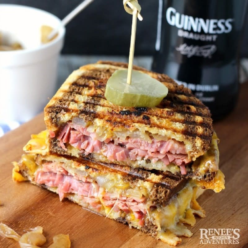 <p>Renee's Kitchen Adventures</p><p>This an easy recipe for corned beef sandwiches with Guinness-infused onions, and cheddar cheese, on marble rye bread.</p><p><strong>Get the recipe: </strong><strong><a href="https://www.reneeskitchenadventures.com/2017/03/corned-beef-panini-with-caramelized.html?m=1" rel="nofollow noopener" target="_blank" data-ylk="slk:Corned Beef Panini with Caramelized Guinness Onions;elm:context_link;itc:0;sec:content-canvas" class="link ">Corned Beef Panini with Caramelized Guinness Onions</a></strong></p><p><strong>Related: <a href="https://www.yahoo.com/lifestyle/22-mouthwatering-bagel-sandwiches-upgrade-144542153.html" data-ylk="slk:Best Bagel Sandwich Recipes;elm:context_link;itc:0;sec:content-canvas;outcm:mb_qualified_link;_E:mb_qualified_link;ct:story;" class="link  yahoo-link">Best Bagel Sandwich Recipes</a></strong></p>