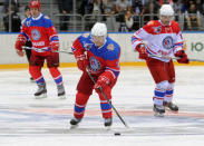 Russian President Vladimir Putin takes part in a gala game of the Night Ice Hockey League in Sochi, Russia, May 10, 2016. Sputnik/Kremlin via Reuters