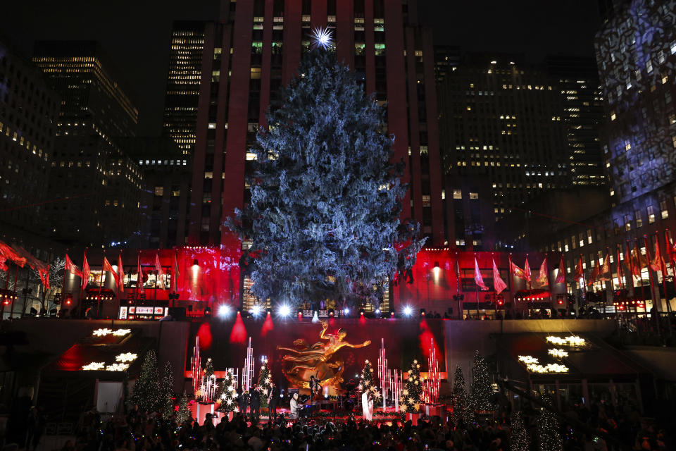 Katherine McPhee and David Foster perform during the 90th annual Rockefeller Center Christmas tree lighting ceremony, Wednesday, Nov. 30, 2022, in New York. (AP Photo/Julia Nikhinson)