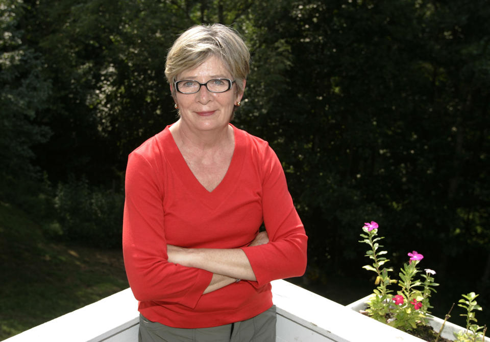 FILE - Author Barbara Ehrenreich poses at her home in Charlottesville, Va., on Aug. 25, 2005. Ehrenreich, the muckraking author, activist and journalist who in such notable works as “Nickel and Dimed” and “Bait and Switch" challenged conventional thinking about class, religion and the very idea of an American dream, died Thursday morning, Sept. 1, 2022 in Alexandria, Virginia, according to her son. She was 81. (AP Photo/Andrew Shurtleff, File)