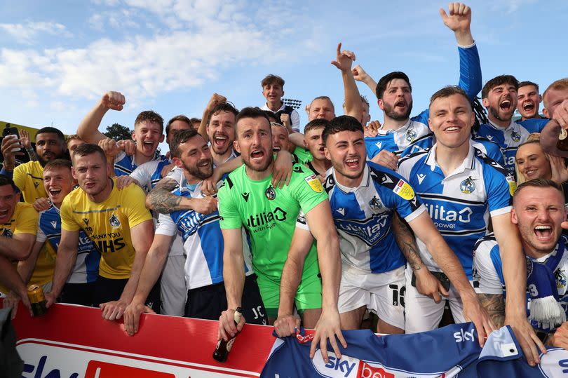Bristol Rovers players celebrate their promotion from League Two in 2022 -Credit:Bradley Collyer/PA Wire