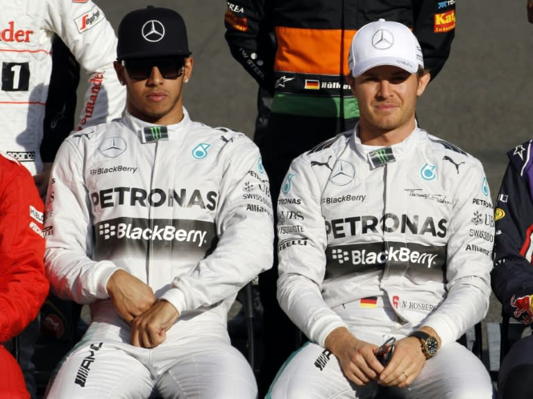 30-year-old Briton Lewis Hamilton (L) secured his Formula One GP second title and first with Mercedes at the Abu Dhabi track in 2014, in a tense showdown with his German team-mate Nico Rosberg, who was hit by mechanical problems