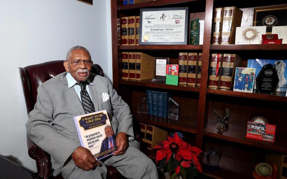 Judge L. Clifford Davis, 99, holds a book, released by local attorney Bobbie Edmonds, about this life and legacy. Davis opened the first African-American law office in Texas and one of the first Black district judges appointed in Tarrant County.