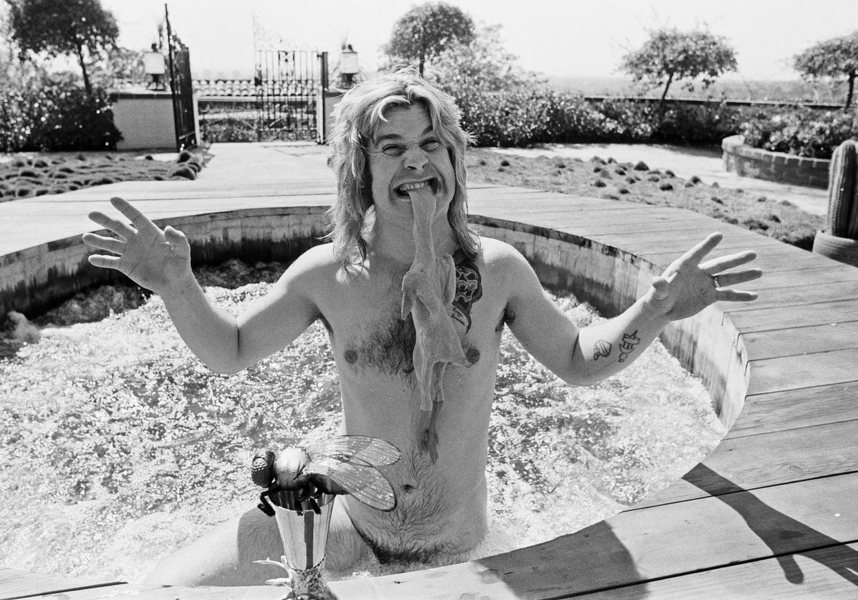 Ozzy Osbourne biting the head of a rubber chicken in April 1982. (Photo: Eddie Sanderson/Getty Images)