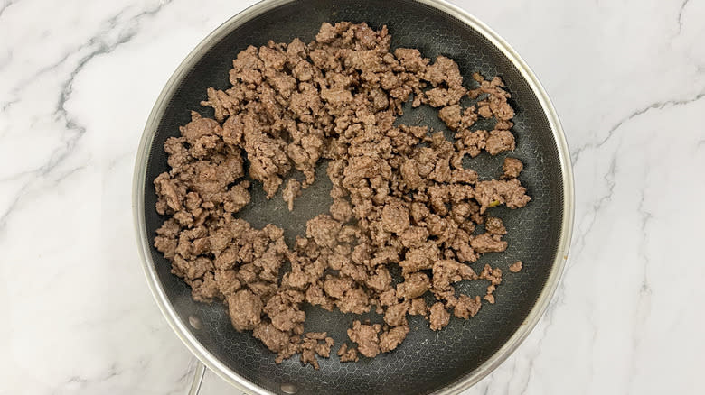 cooked ground beef in pan