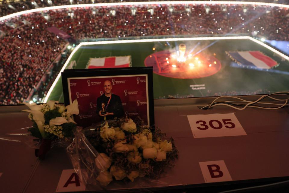 A tribute for U.S. journalist Grant Wahl is displayed at the World Cup quarterfinal match between England and France at the Al Bayt Stadium in Al Khor, north of Doha, on Dec. 10, 2022. / Credit: JACK GUEZ/AFP/Getty Images