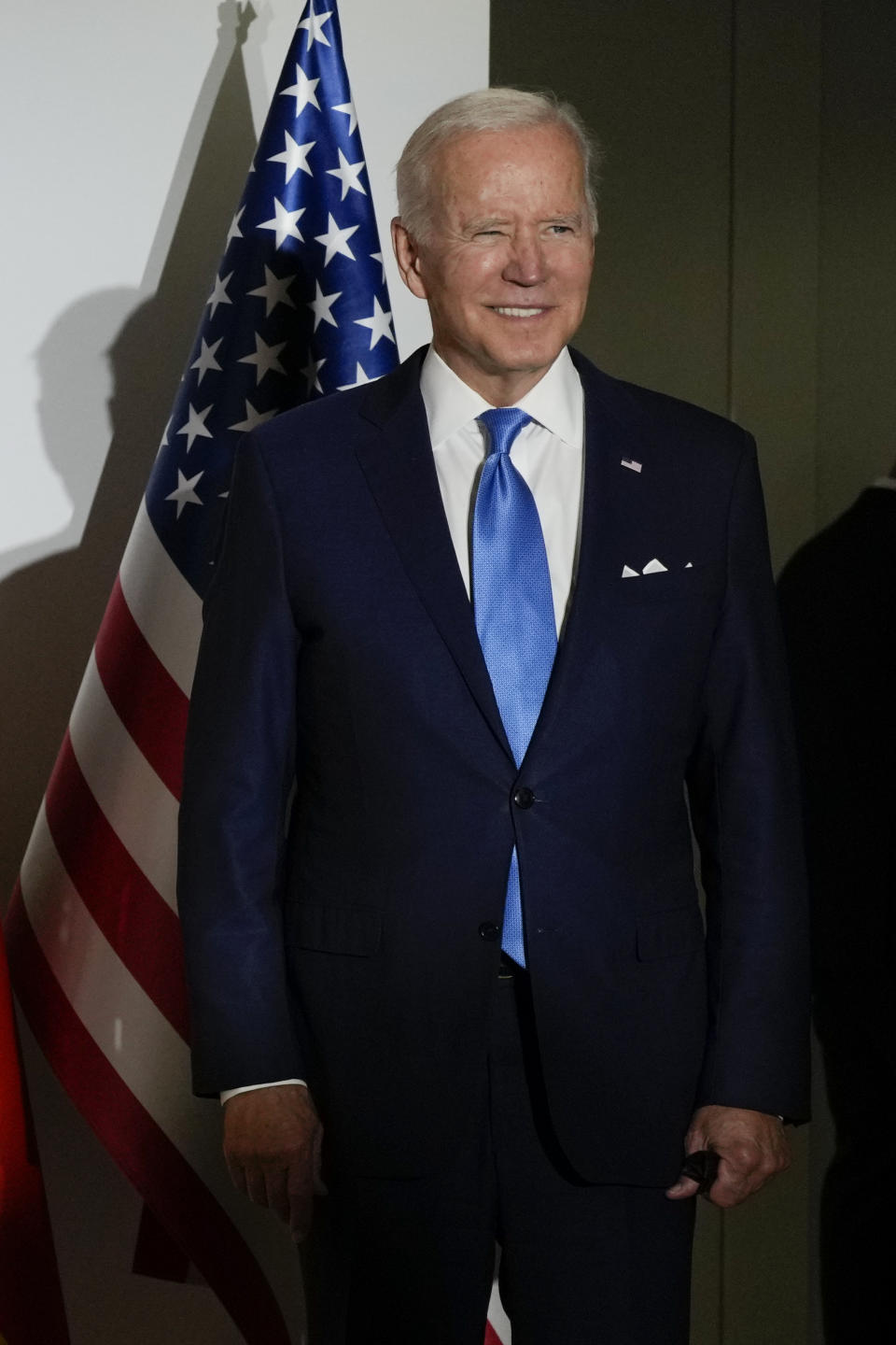 U.S. President Joe Biden smiles when posing for a picture at the La Nuvola conference center for the G20 summit in Rome, Saturday, Oct. 30, 2021. The two-day Group of 20 summit is the first in-person gathering of leaders of the world's biggest economies since the COVID-19 pandemic started. (AP Photo/Kirsty Wigglesworth, Pool)